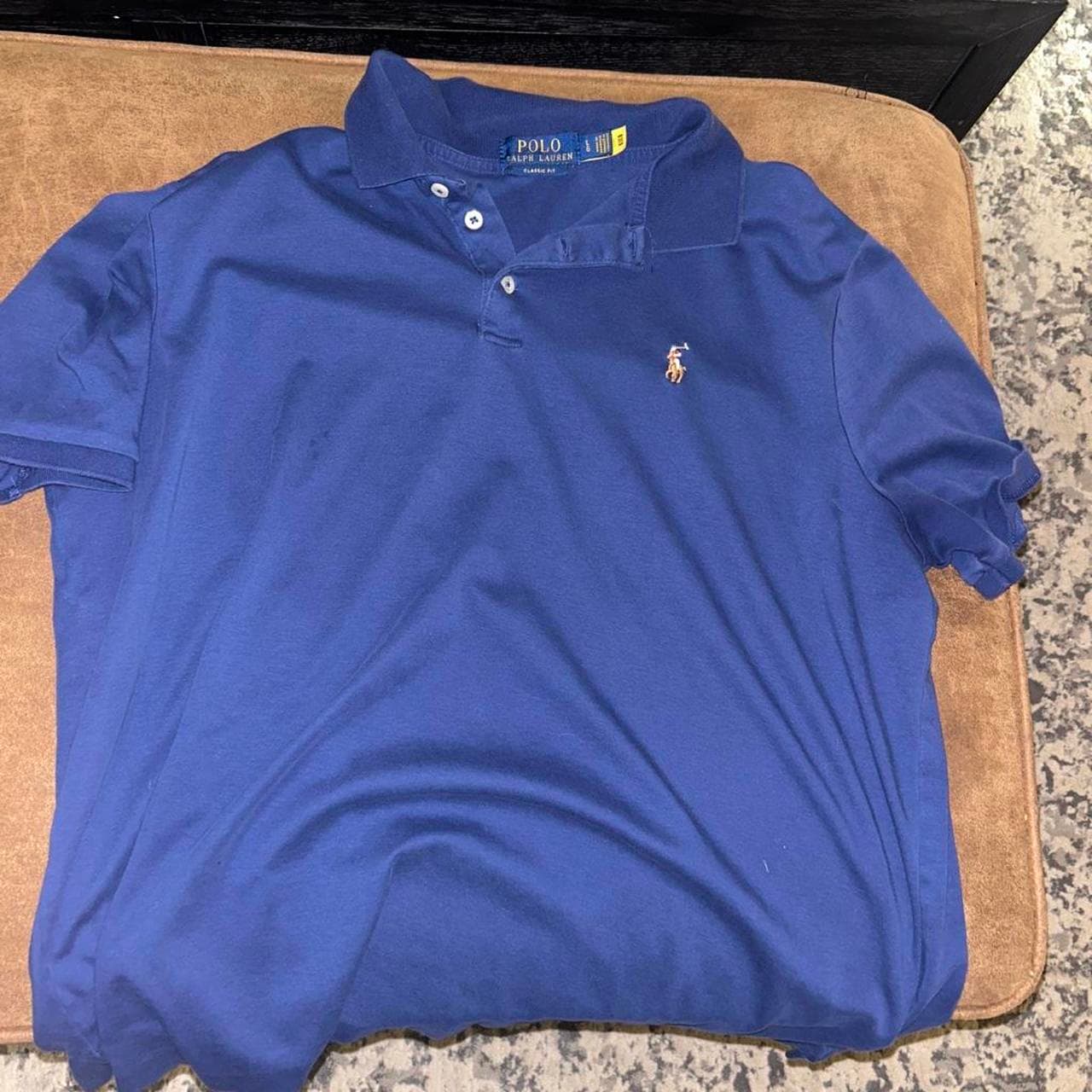 חולצת פולו כחולה · Polo Ralph Lauren