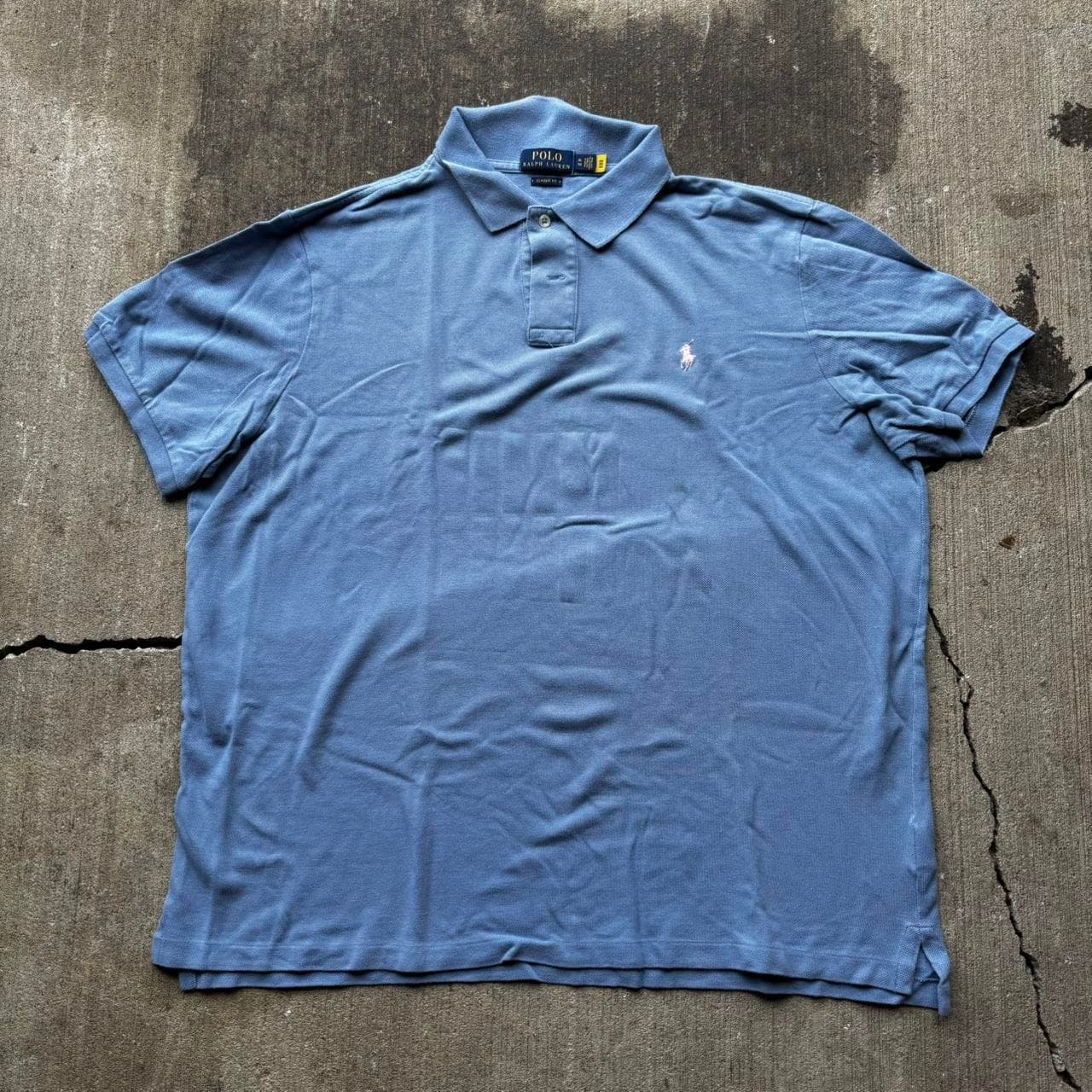 חולצת פולו תכלת · Polo Ralph Lauren