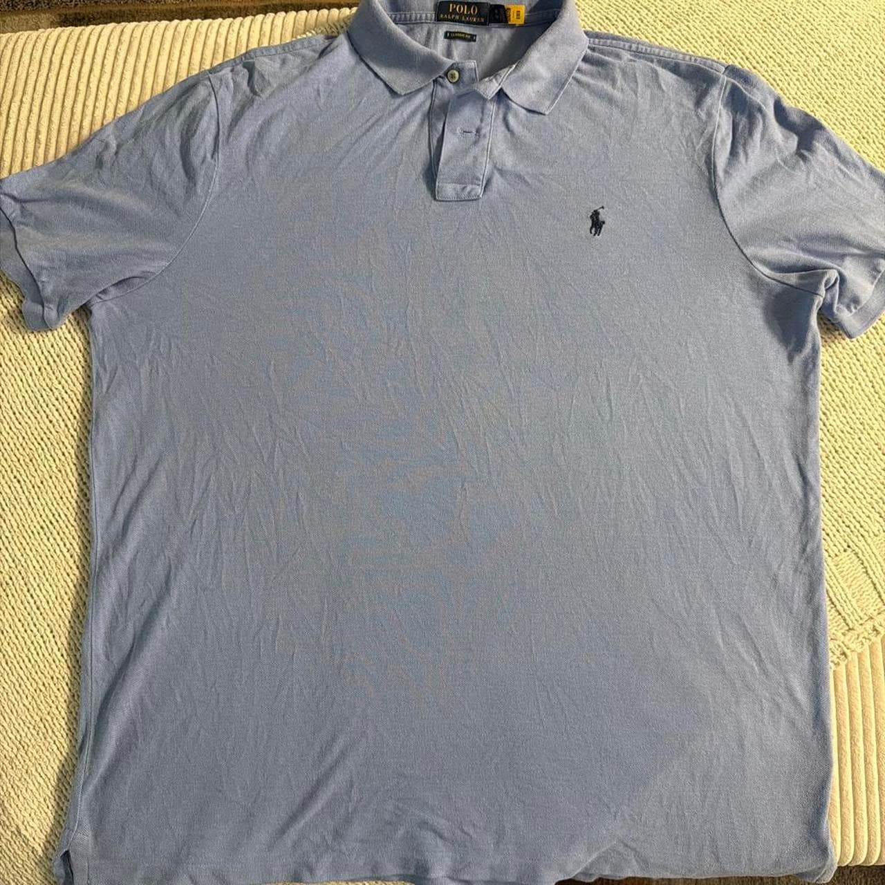 חולצת פולו תכלת · Polo Ralph Lauren