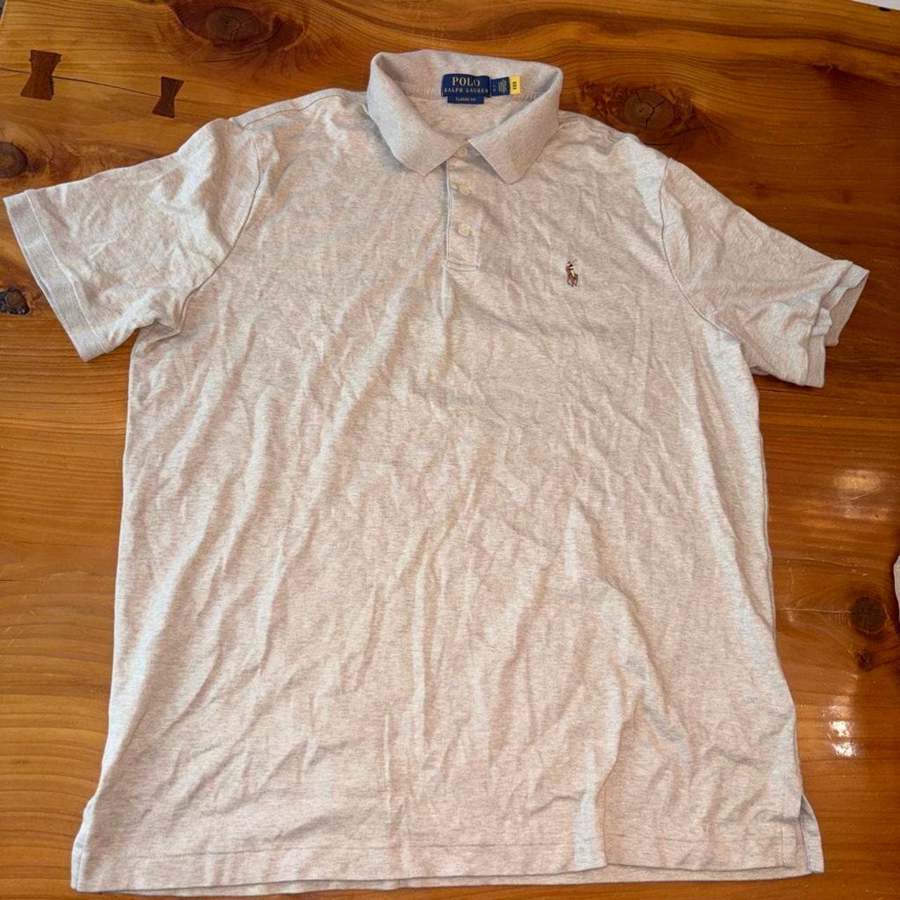 חולצת פולו שמנת · Polo Ralph Lauren